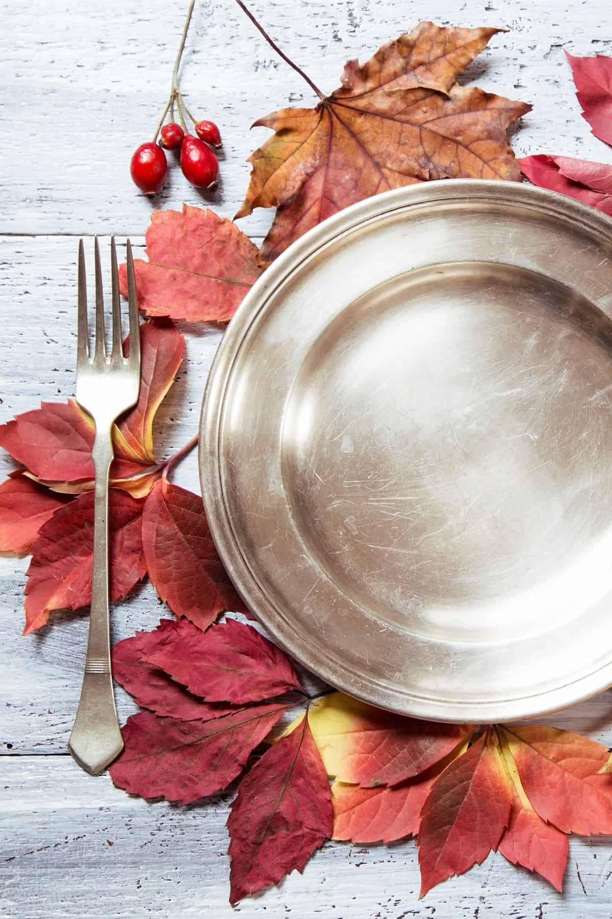 SILVER PLATE AND AUTUMN LEAVES