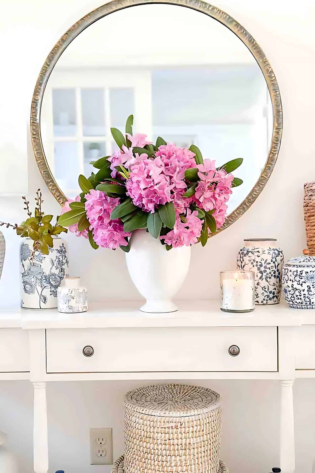 foyer with a vase of beautiful flowers