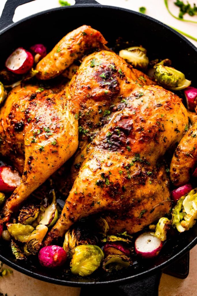 spatchcock chicken in a cast iron skillet