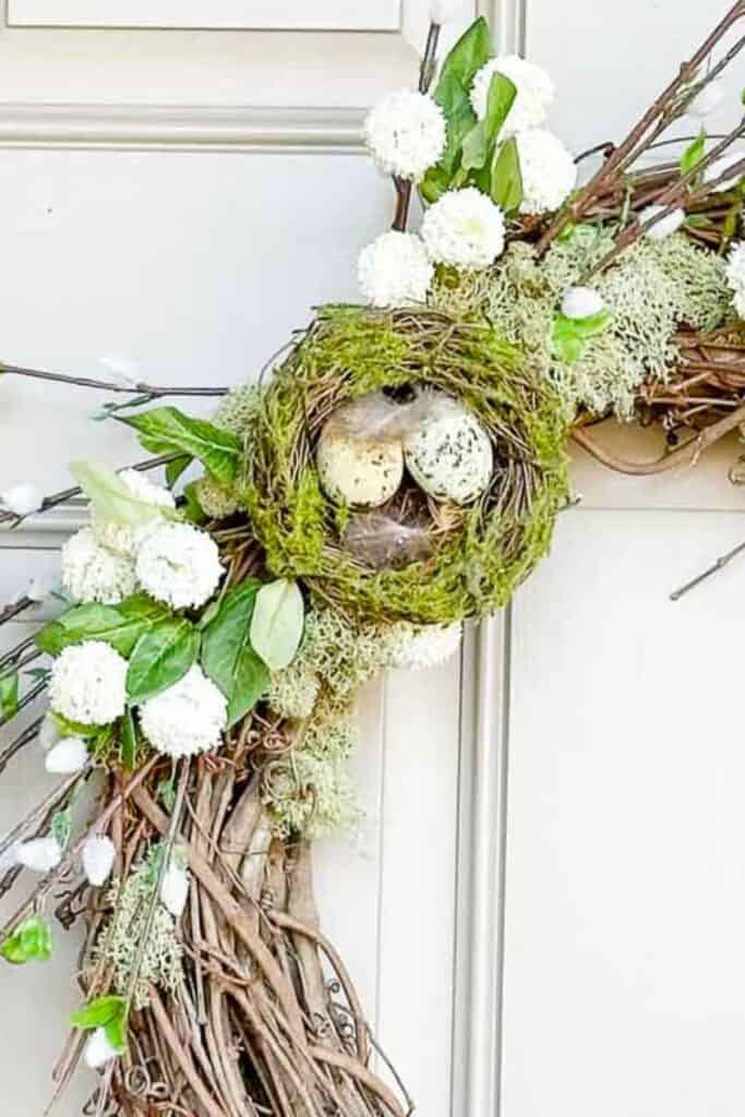 egg and moss on a simple spring wreath