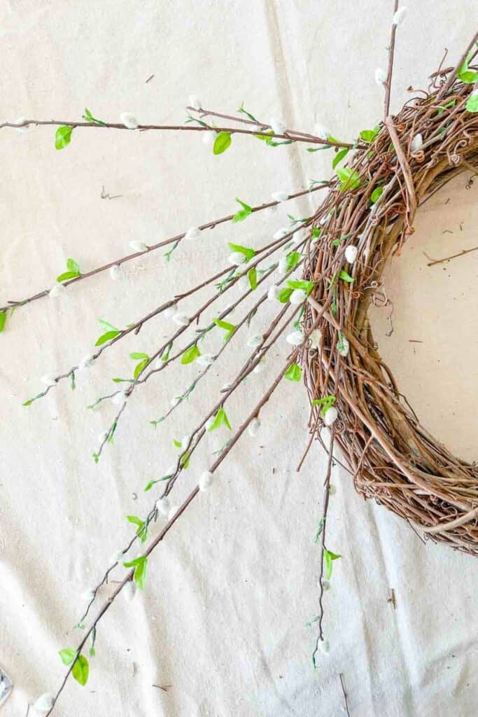filling in more pussy willow on the wreath