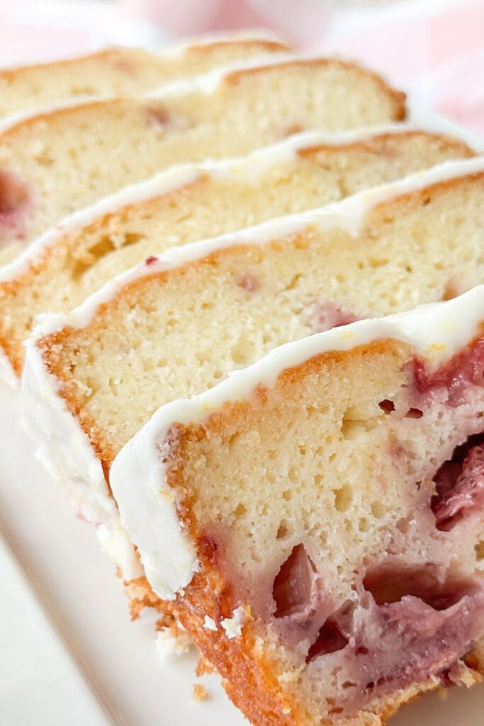strawberry lemon poundcake slises on a white platter