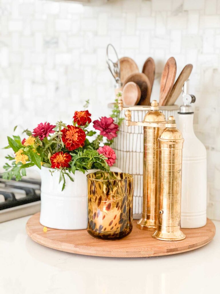 candle in a tortoiseshell  votive