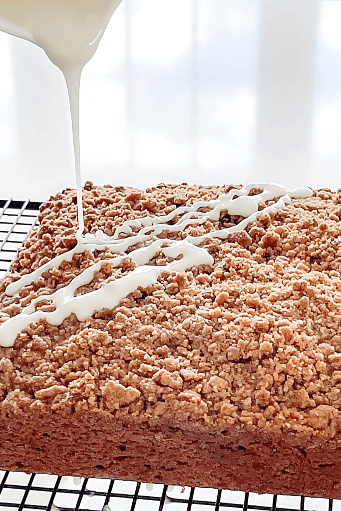 POURING THE GLAZE ON THE COFFEE CAKE