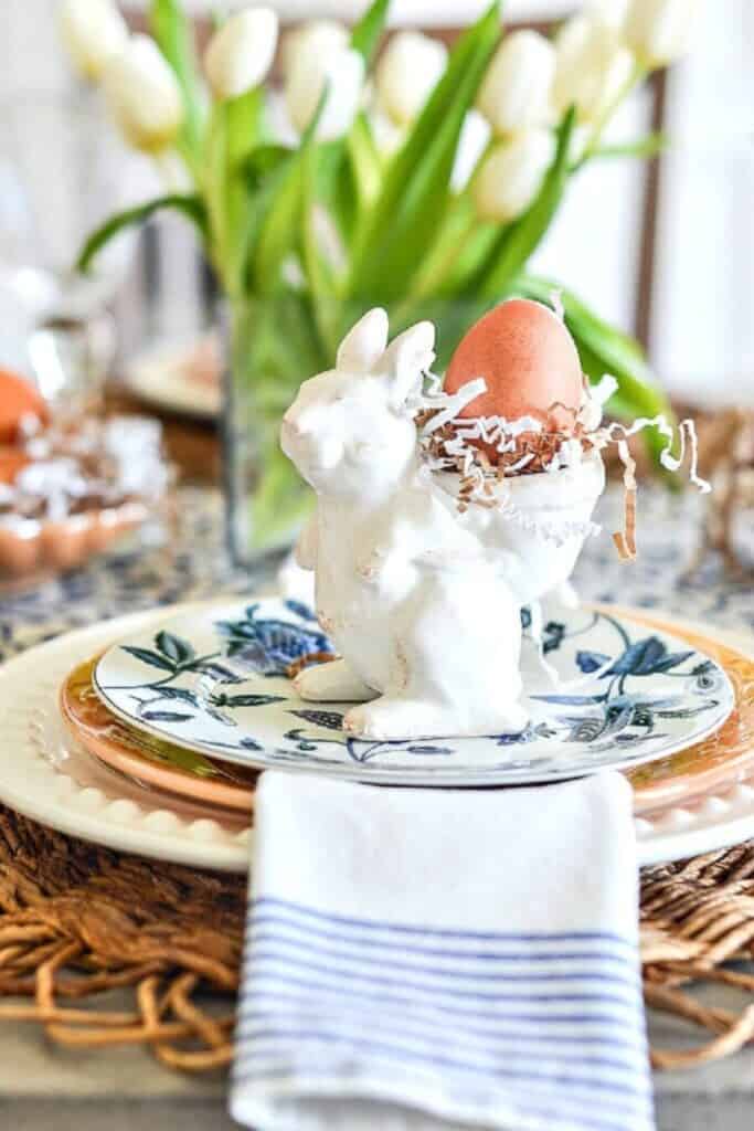 Easter Table Ideas - rabbit egg cups on top of a place setting