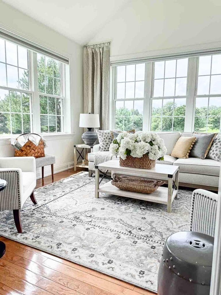 sunroom sofa, cofee table and end table with lamp