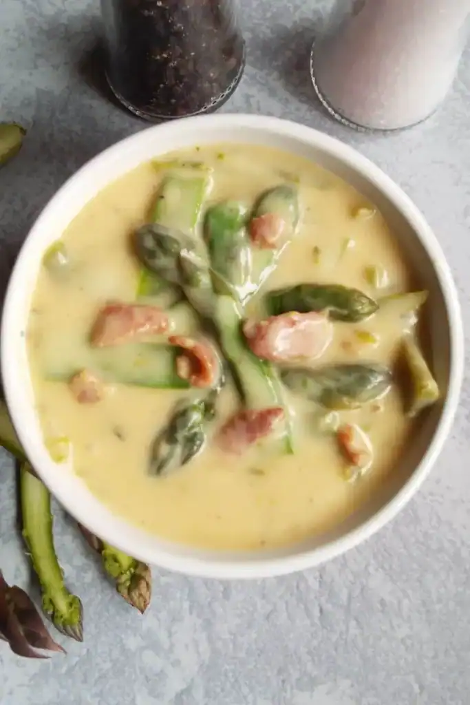 cheese bacon asparagus soup in a bowl