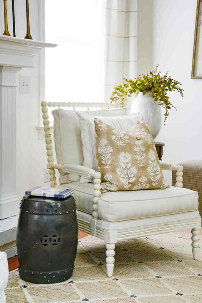 repainted garden stool in a living room