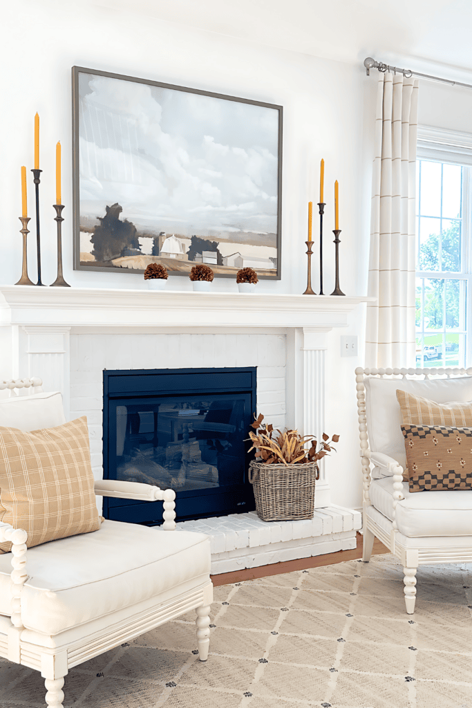 11 FALL MANTEL-candles on either side of a pice of art