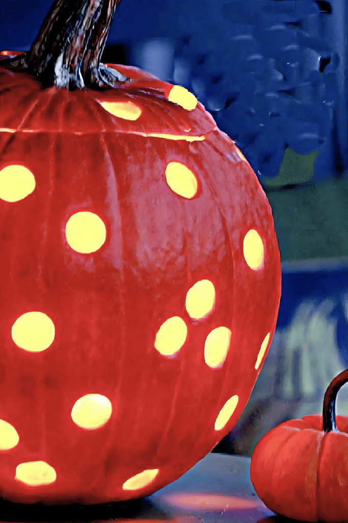 PRESERVING PUMPKINS AND GOURDS- CARVED PUMPKIN WITH A CANDLE IN IT