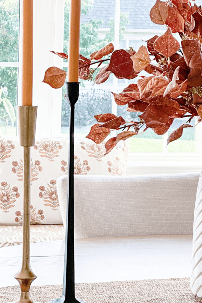 candlesticks and fall arrangement