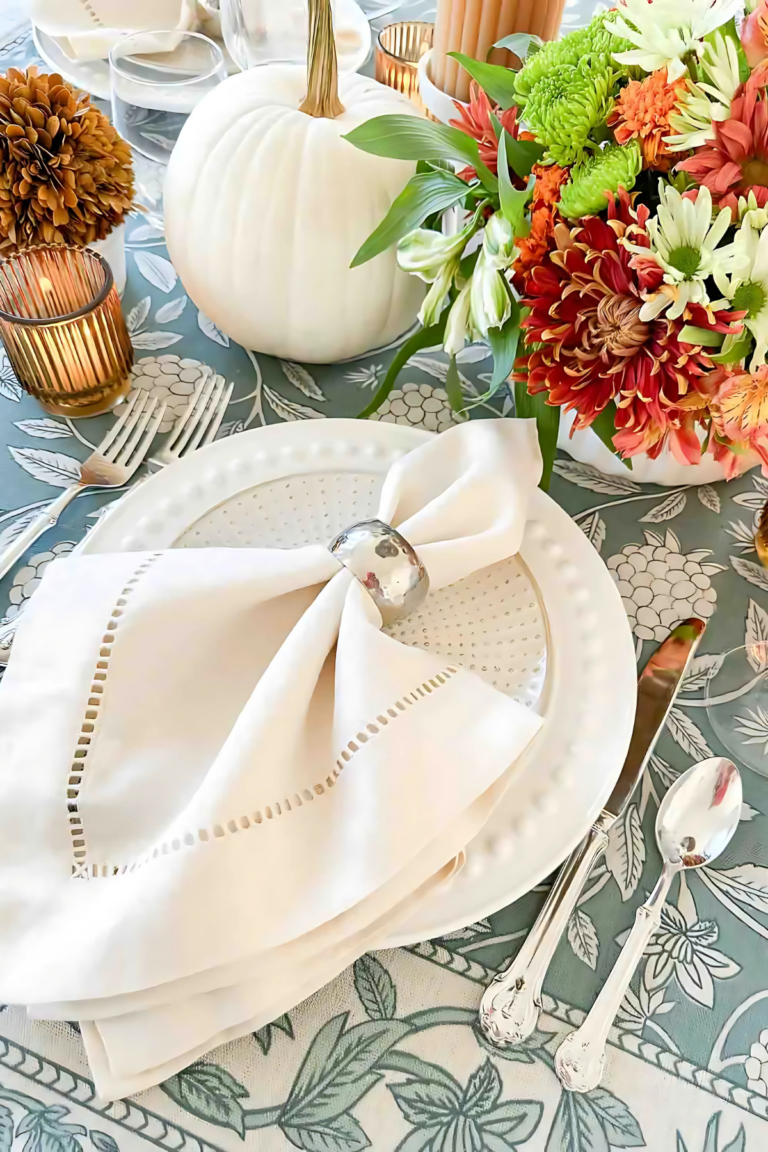 Thanksgiving table- place setting with white dishes.