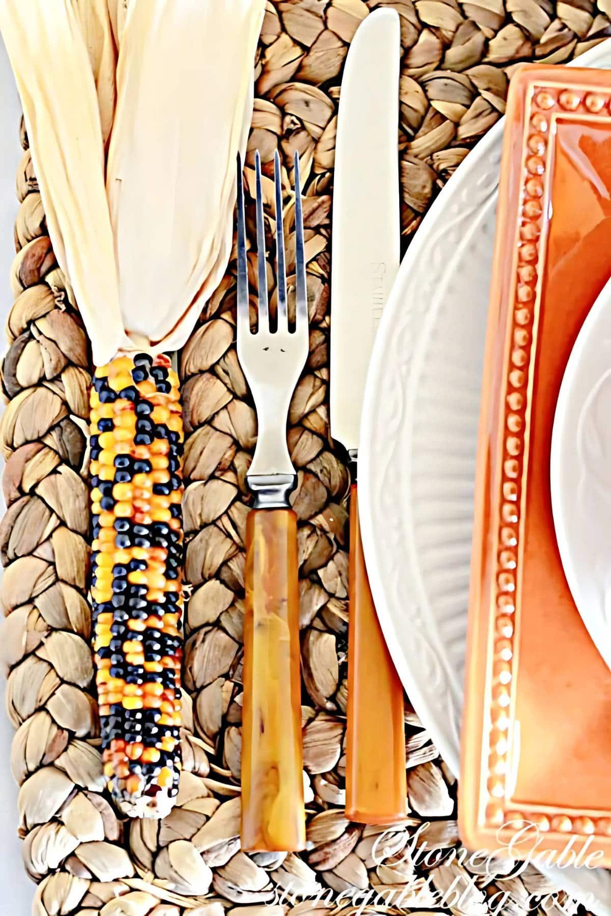 Thanksgiving place setting with a mini Indian Corn