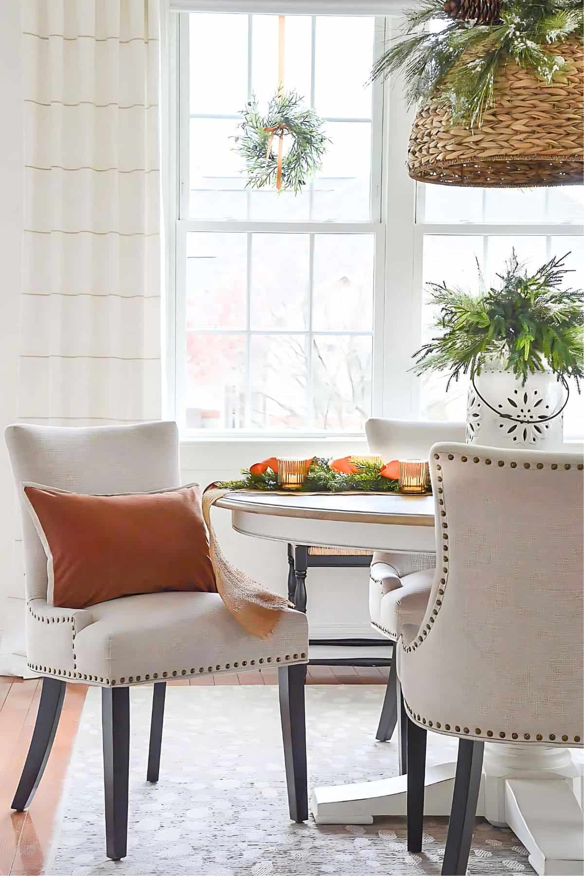 Christmas dining room with copper colored pillow