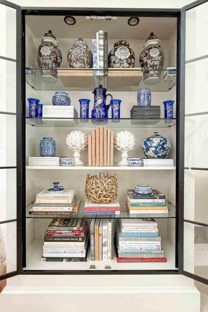 curio cabinet filled with collected treasures and family heirlooms