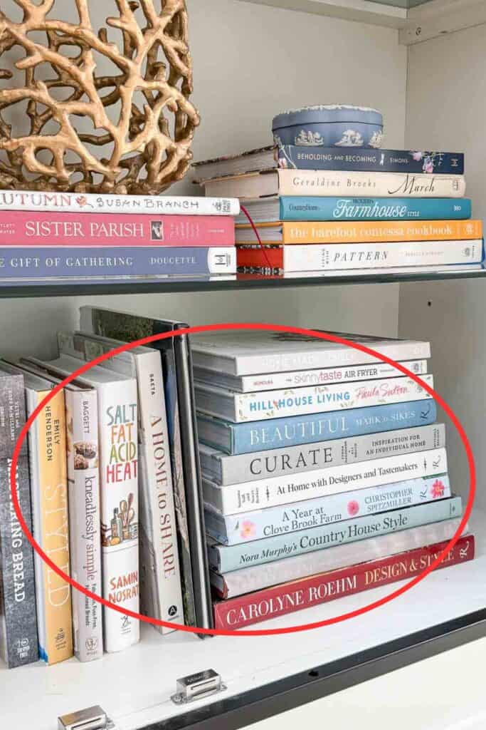 books arranged horizontal and vertical for bookshelf styling