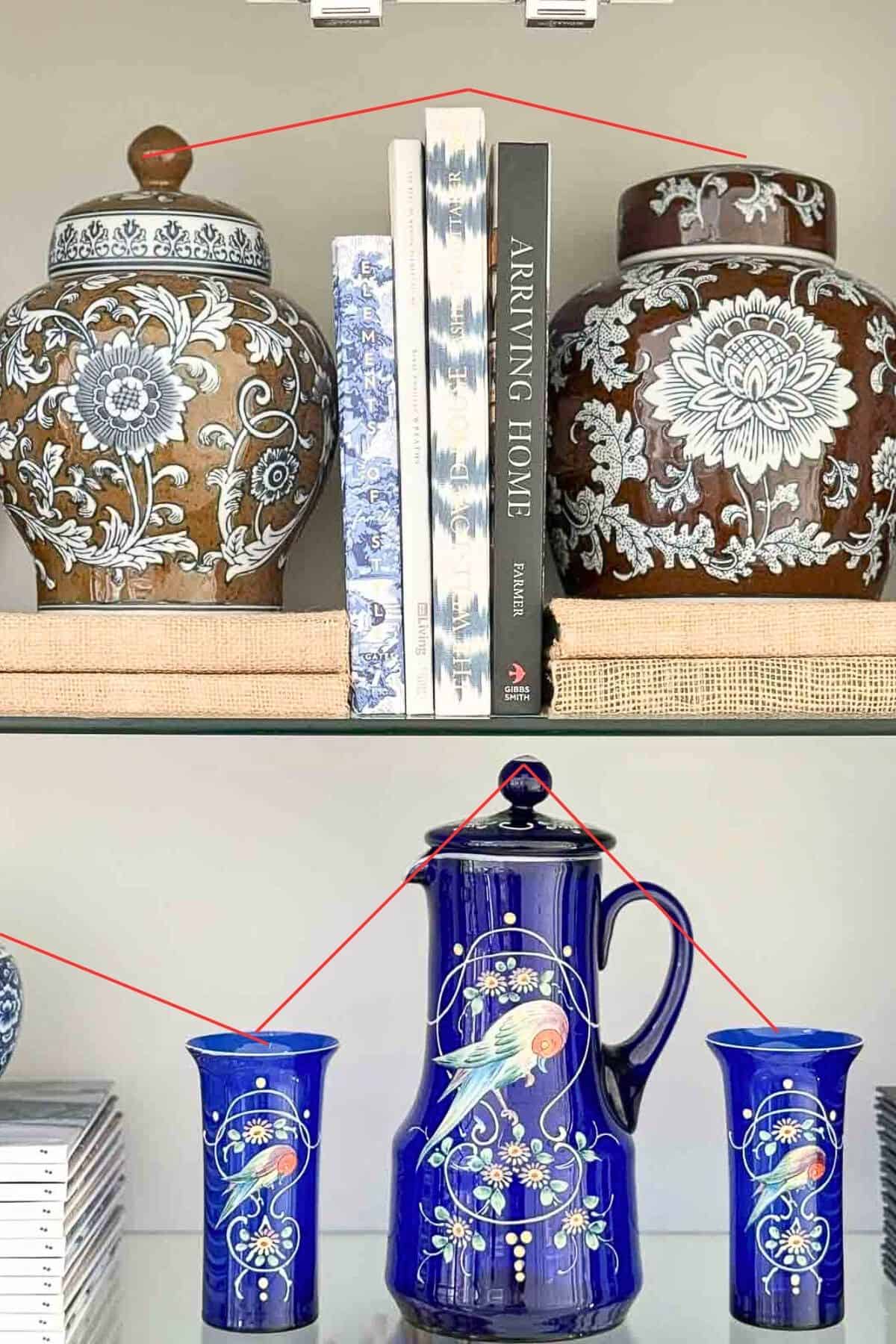 curio cabinet styled with accessories in varying heights for interest