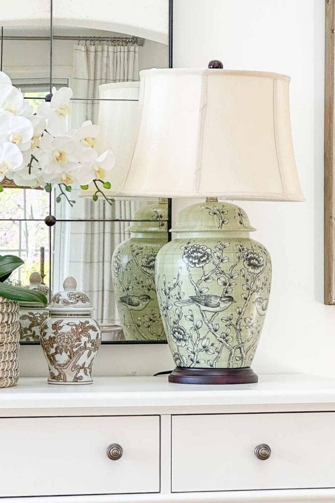 green lamp on a white buffet