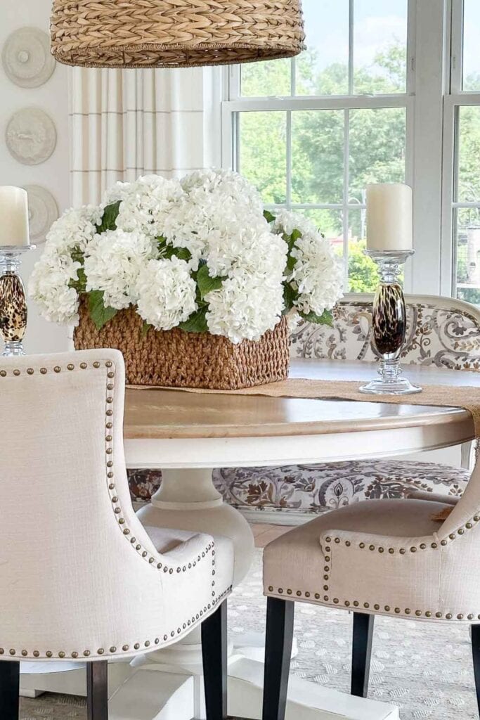 brown paisley print in an upholstered bench in the dining room