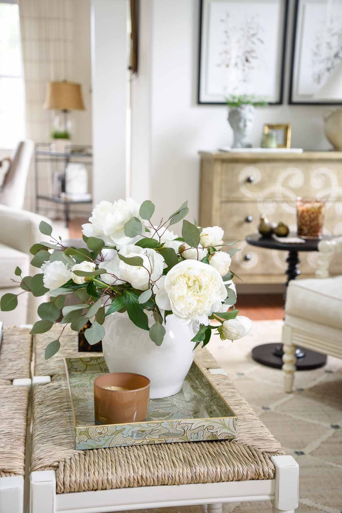1- STORIED HOME: PEONIES IN A TRAY ON A THRUSH TOPPED COFFEE TABLE