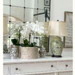 round basket with orhids