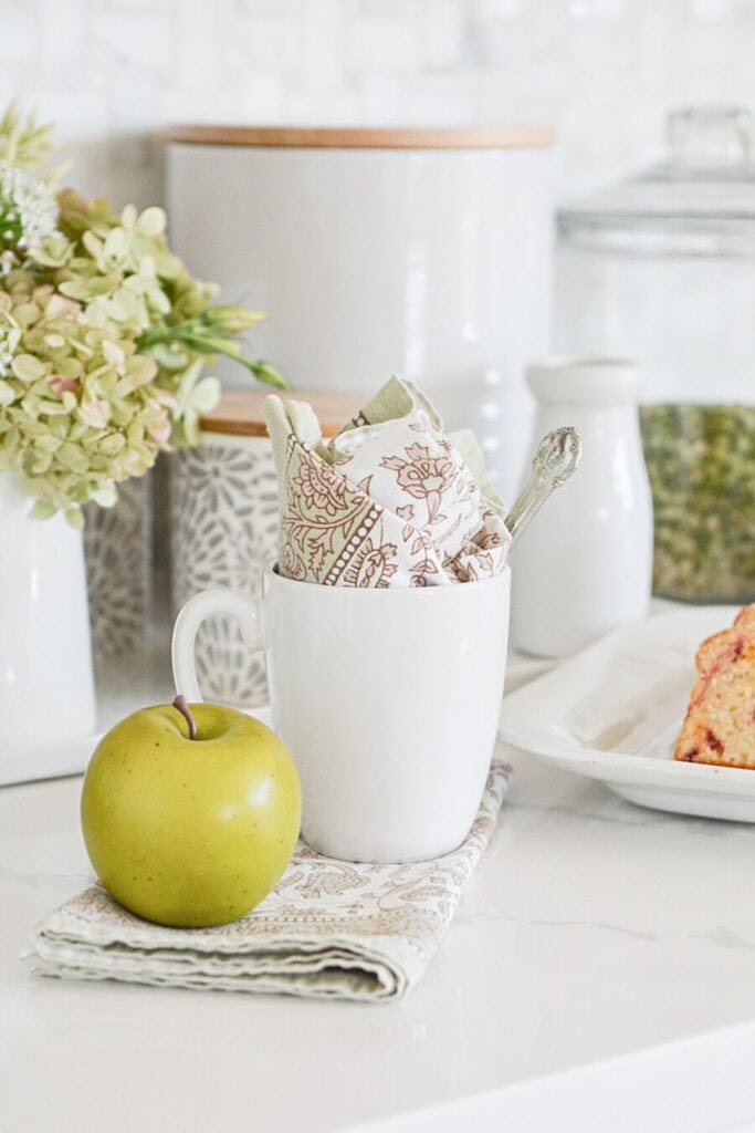 apples on a coffee bar