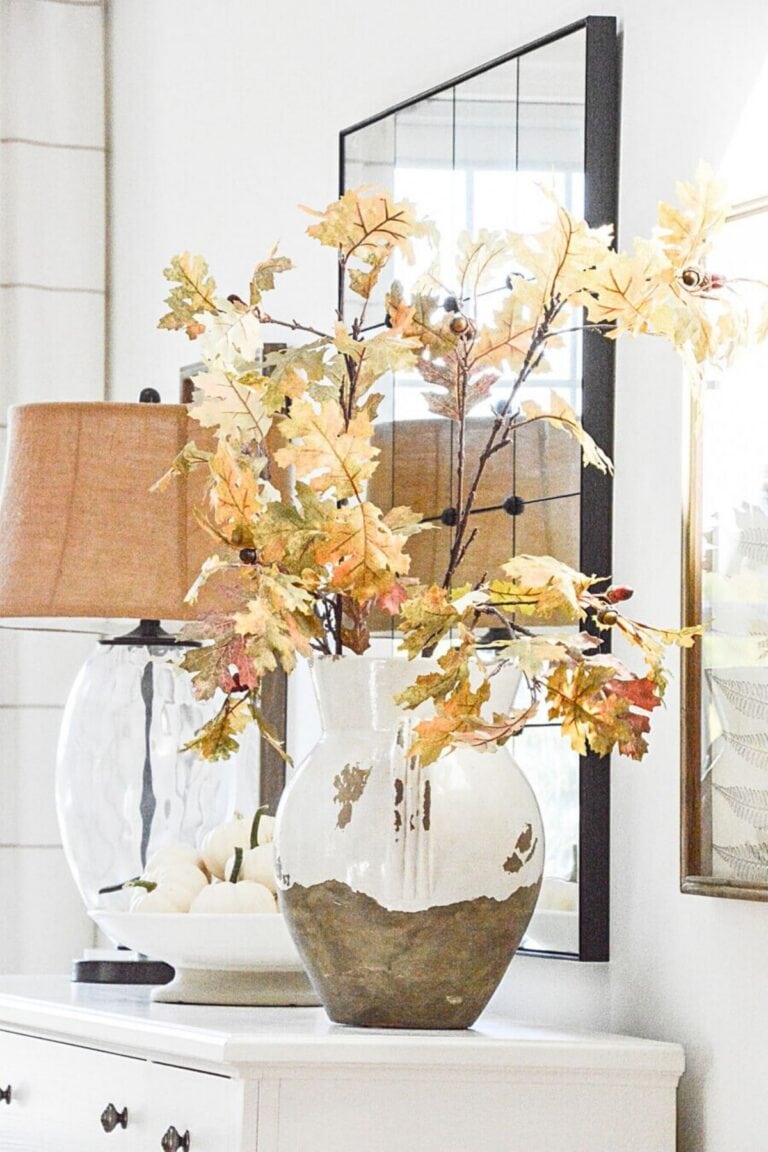 fall oak branches in a large urn