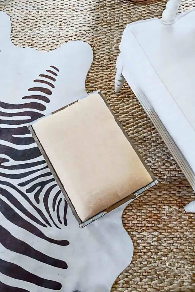 zebra rug on a sisal rug