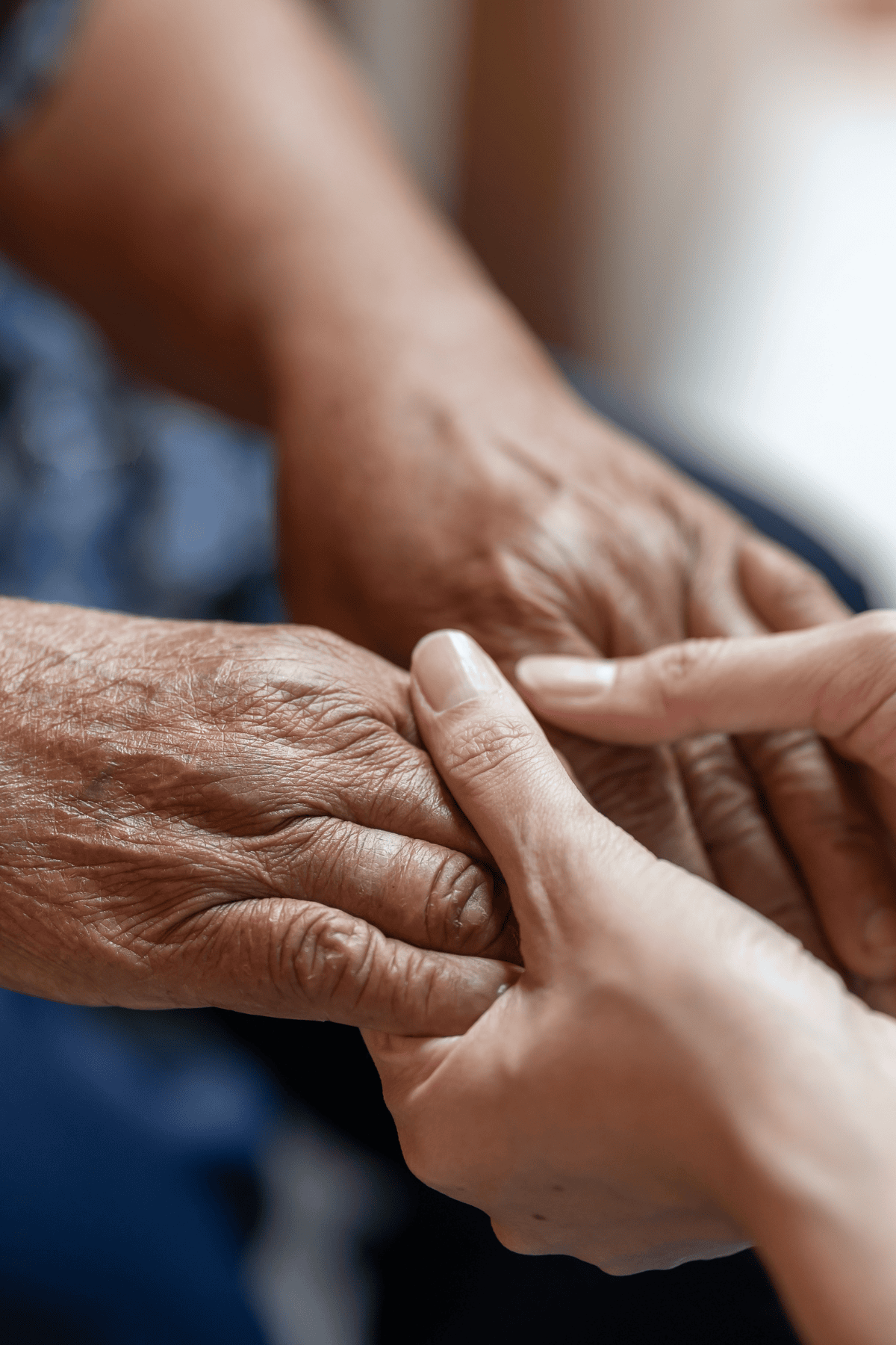 woman holding hands in comfort
