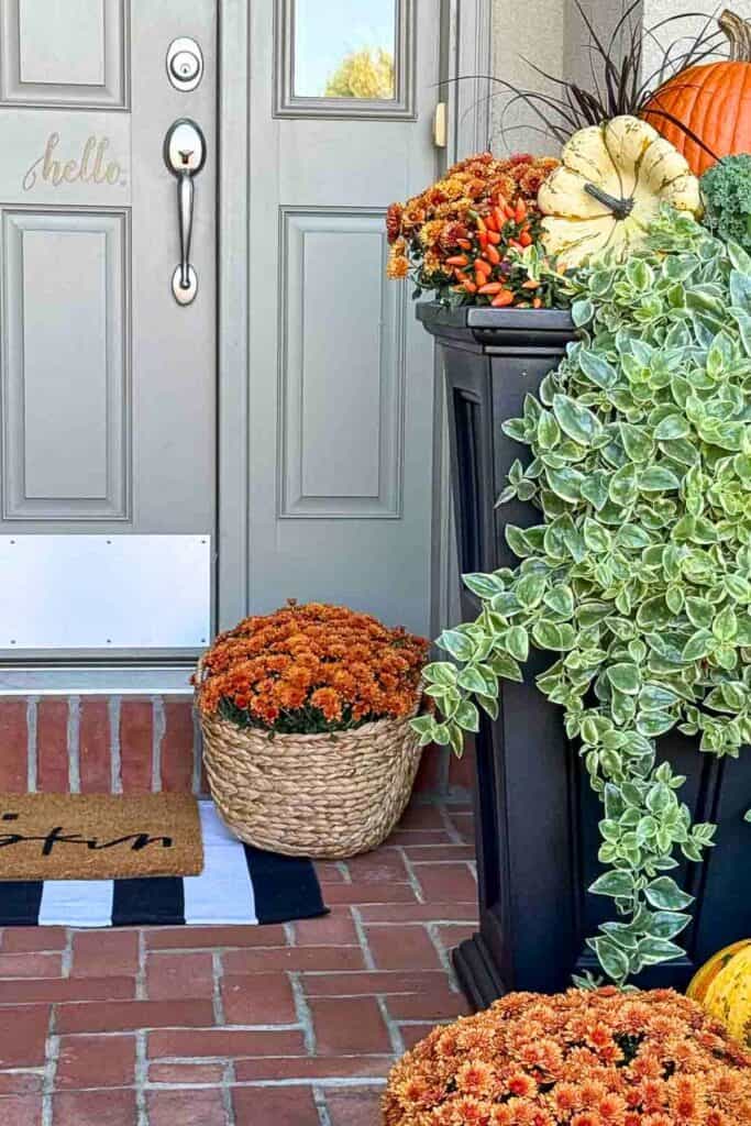 repeated colors and elements on a fall front porch 