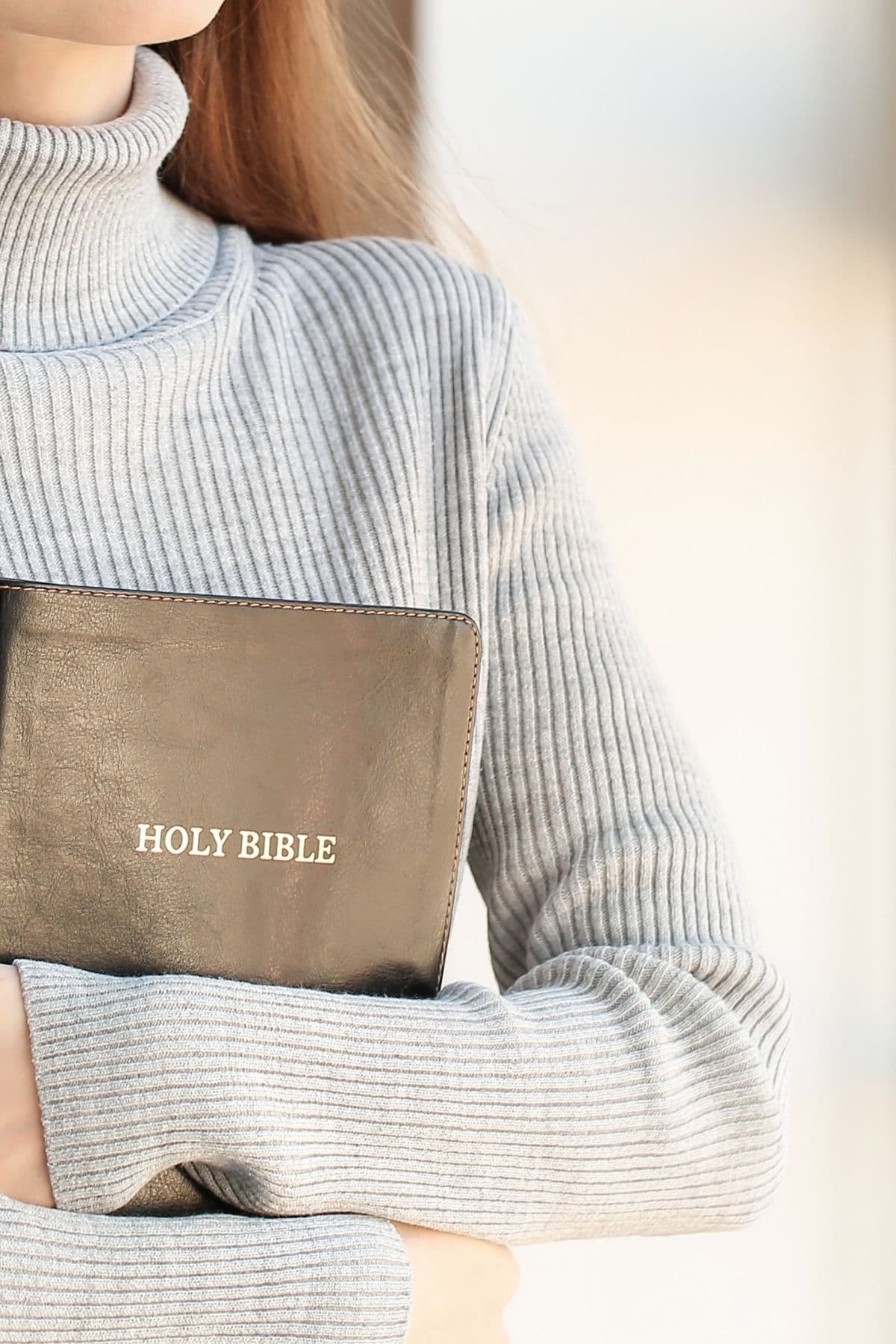lady holding a bible