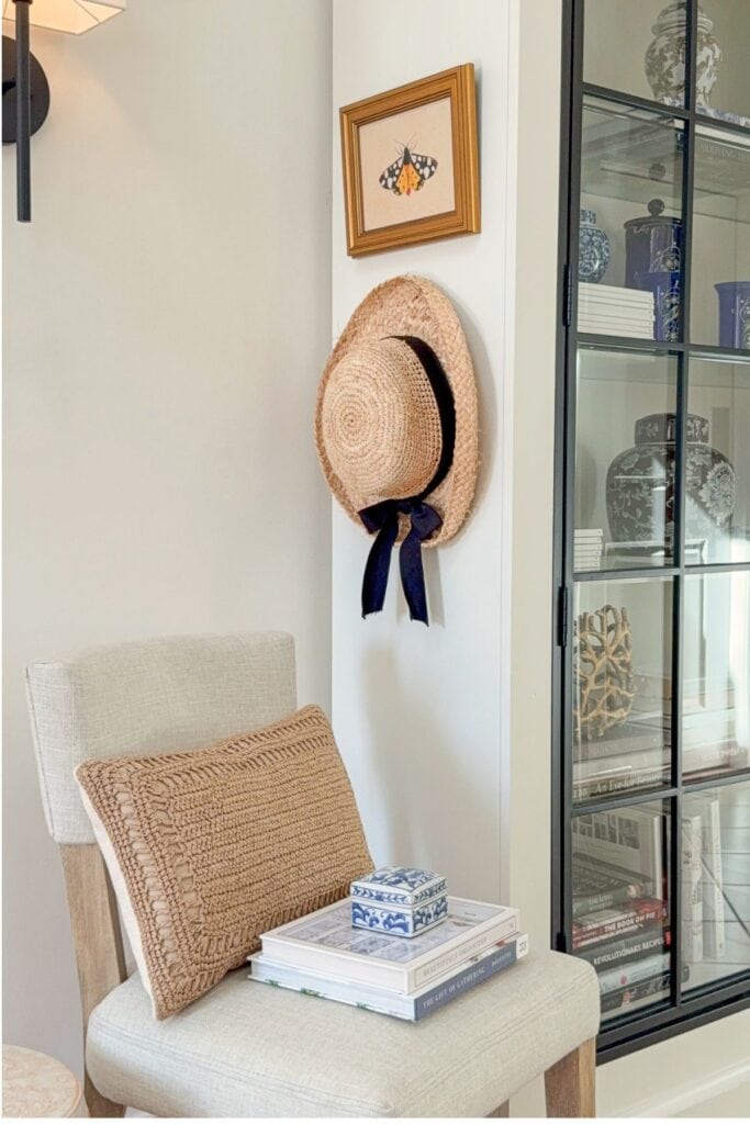 neutral chair with simple decor and subtle summer accents styled for after Easter decorating