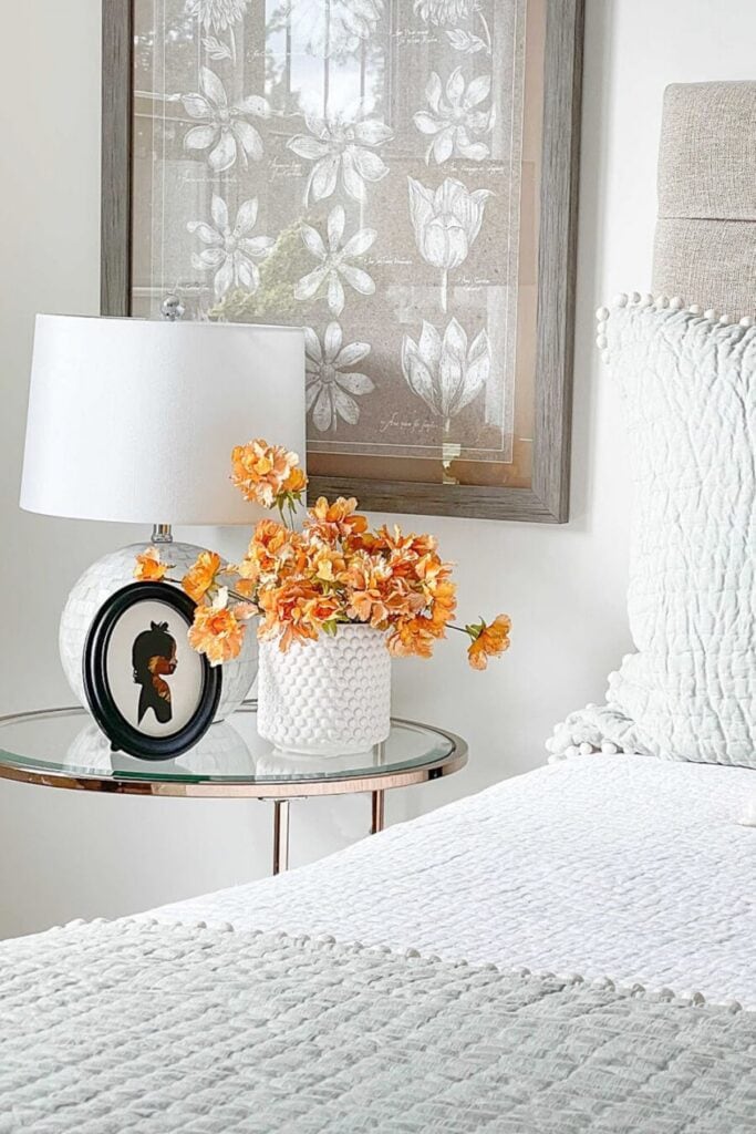 orange flowers on a nightstand