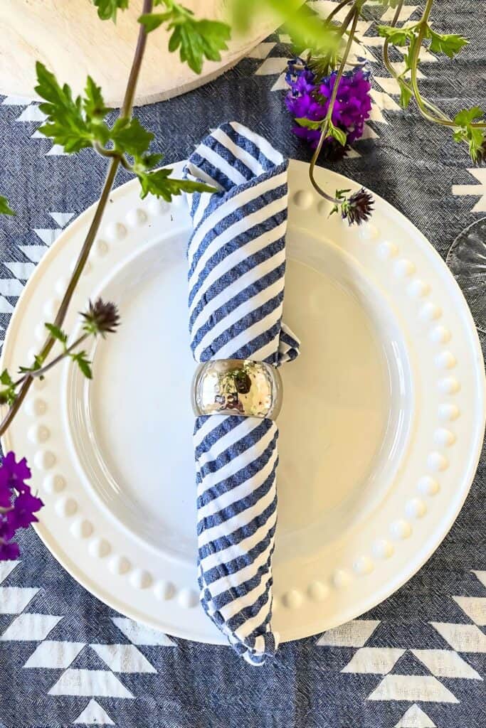 rolled napkin on a plate
