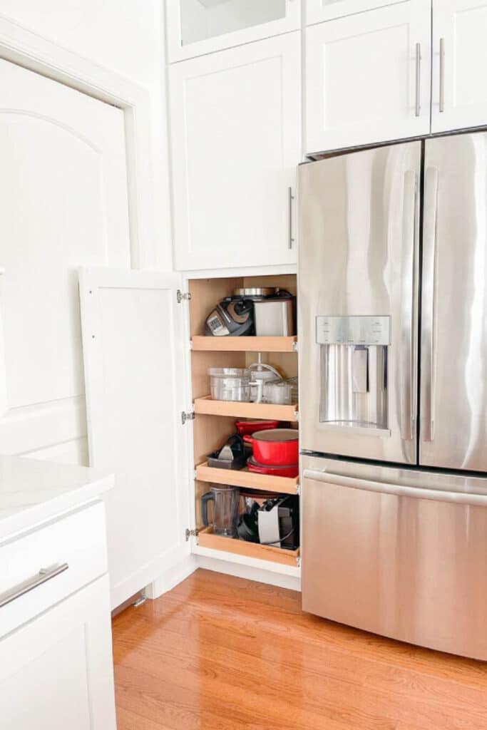 small appliances in a kitchen cabinet