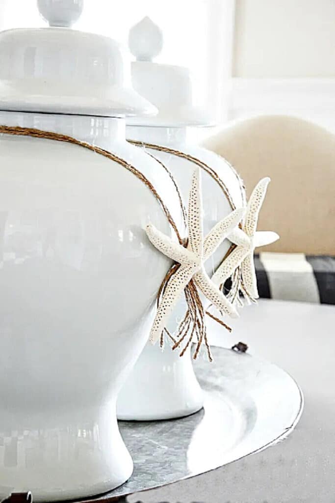 Starfish necklaces on white ginger jars- summer accent decor