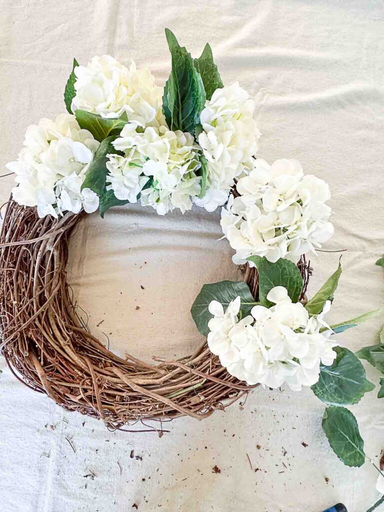 WHITE HYDRANGEA WREATH- adding hydrangeas