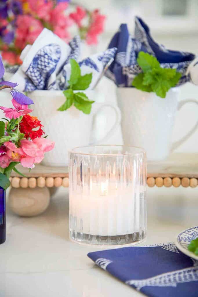 candle on a summer coffee bar