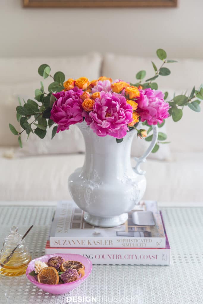 white pitcher with pink peonies