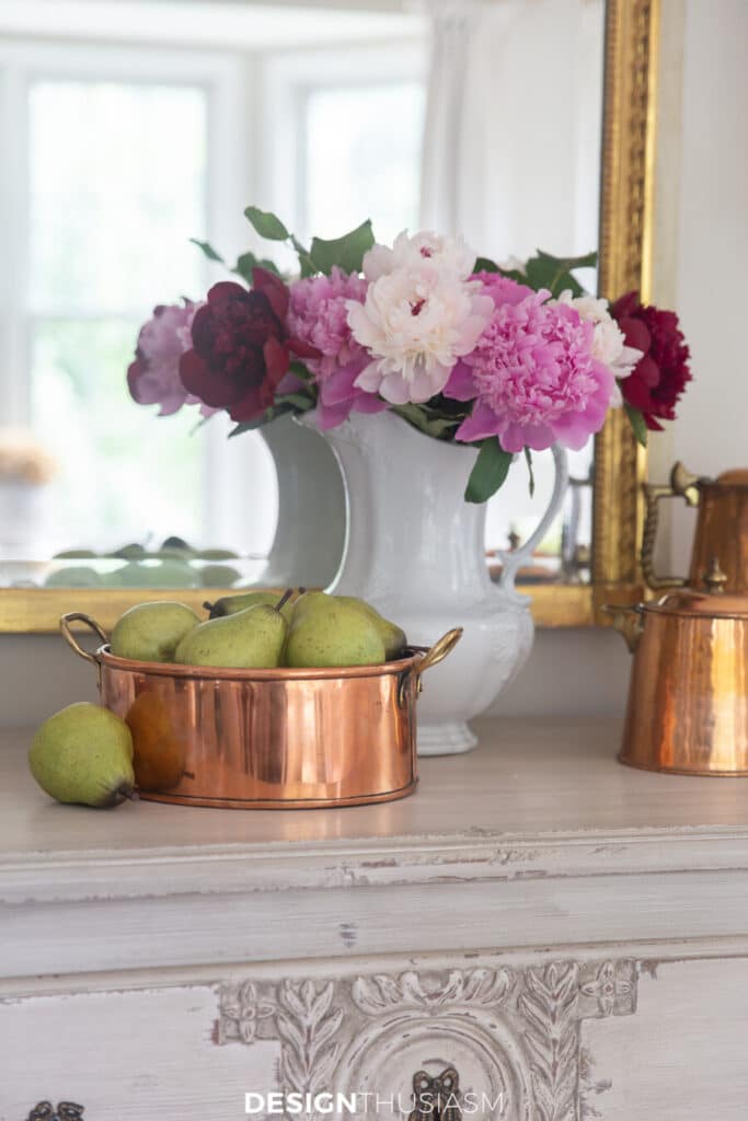 flowers and a copper pot of green pairs