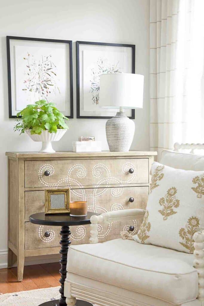 Texture-embroided pillow on a white chair