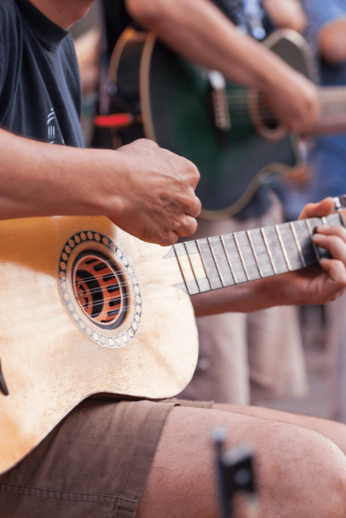 men playing guitars