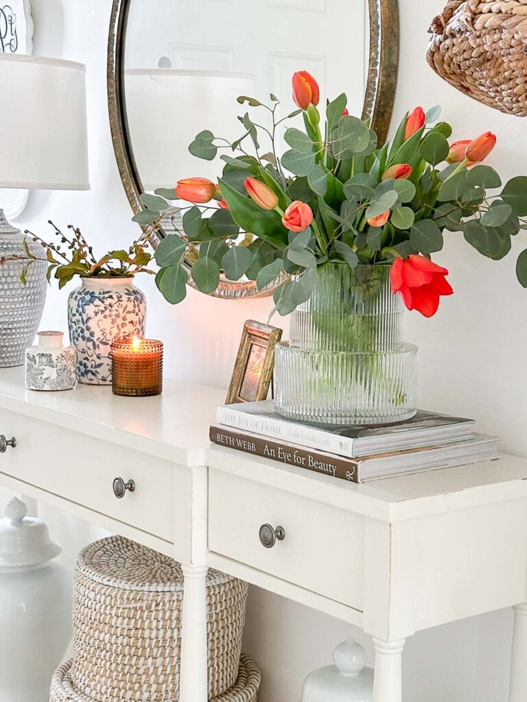 red tulips on a foyer table