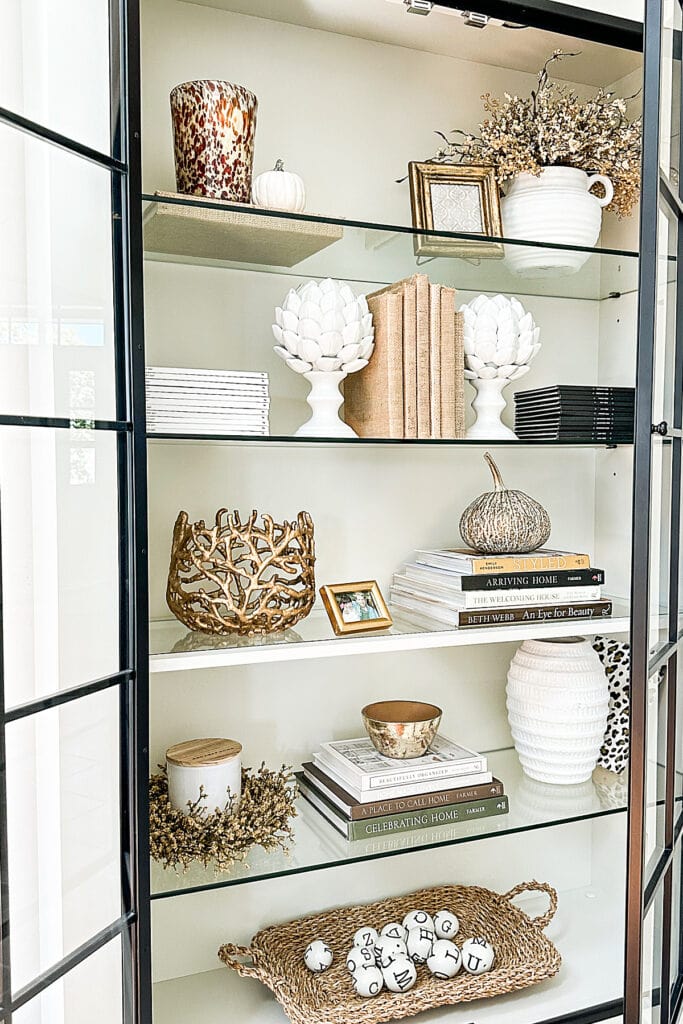 BOOKCASE DECORATED FOR FALL