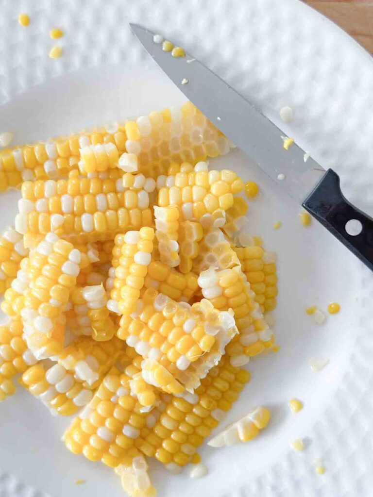CUT CORN KERNELS ON A PLATE