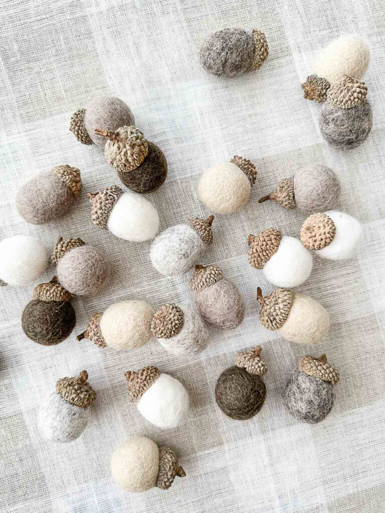 scattered felted wool acorns