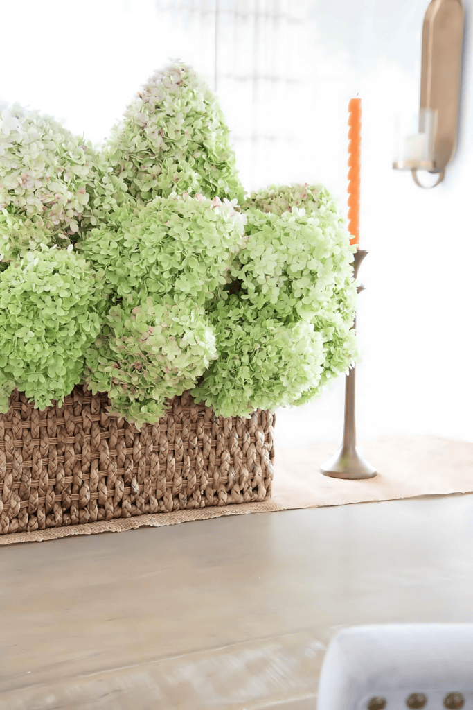 basket of hydrangeas on a dining room table