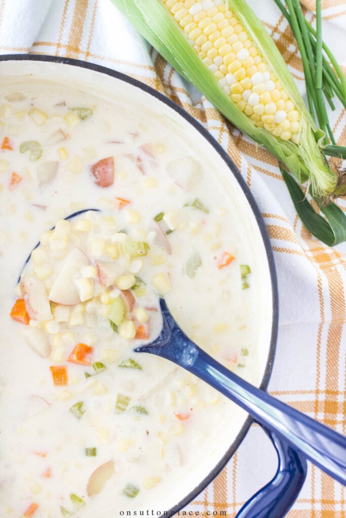 corn chowder in a blue pot