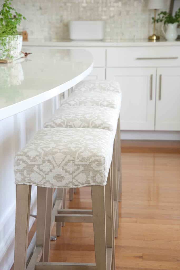 upholstered bar stools in a kitchen