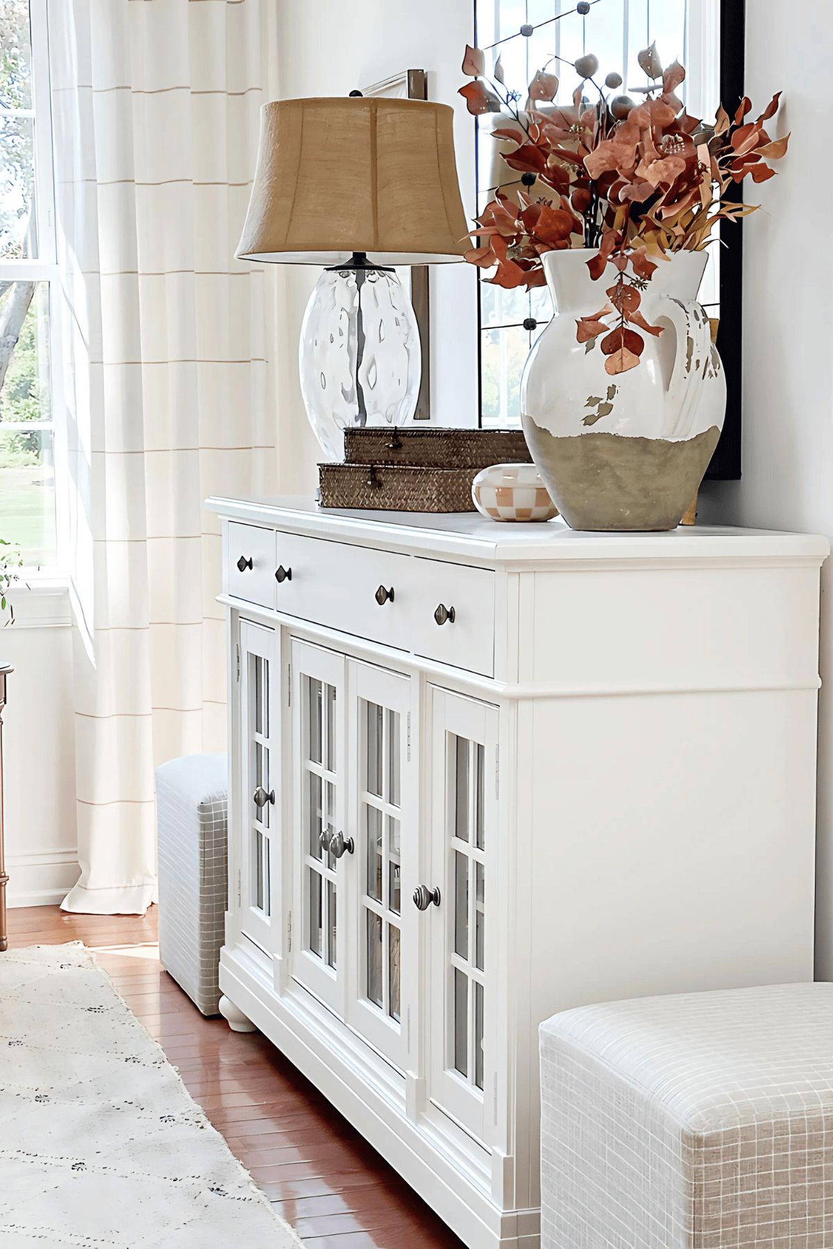 white buffet with fall decor